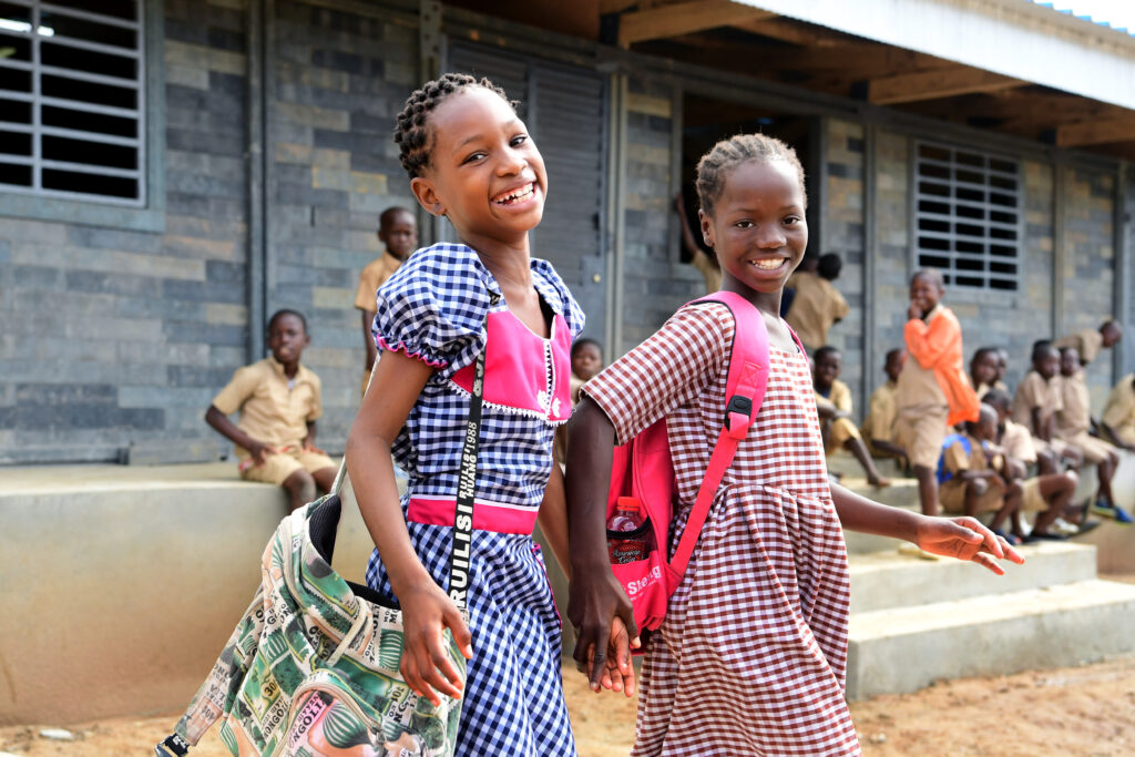 Children at the playground of their school, made out of recycled plastic bricks, in Youpougon, a suburban of Abidjan, in the South of Côte d’Ivoire.